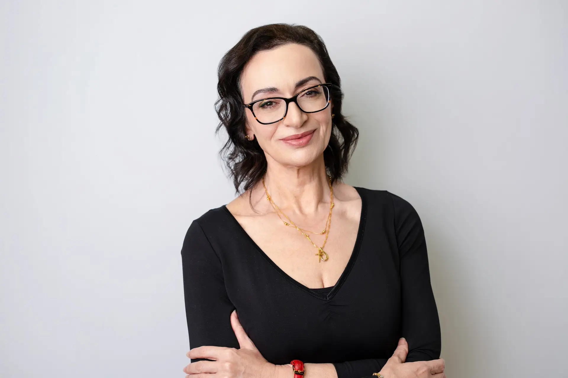 Dr Lucia Saliba headshot on grey background